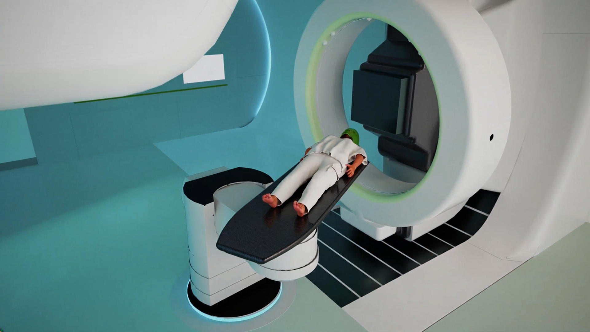 Patient auf der gKteso RPS Behandlungsliege vor einer ringförmigen Radiotherapie-Anlage